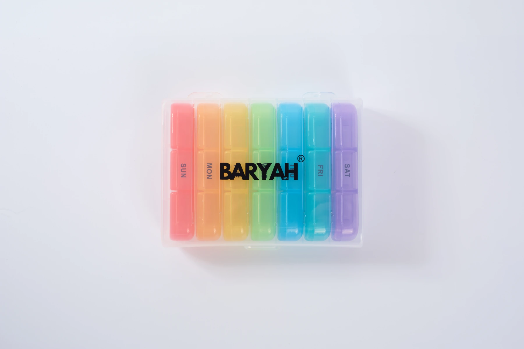 BARYAH rainbow-coloured seven-day organiser in its clear case
